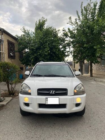 təkərdən əl işləri: Hyundai Tucson: 2 l | 2007 il Ofrouder/SUV