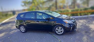 mazda protage: Toyota Prius V: 2012 г., 1.8 л, Вариатор, Гибрид, Универсал — 1