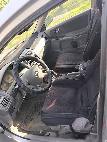 армянский учет: Mazda 626: 1999 г., 1.8 л, Механика, Бензин, Седан — 5