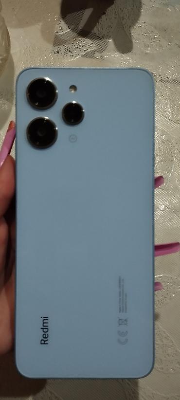 redmi note 9 azerbaycan: Redmi smartfon – açıq göy rəngdə korpus Xüsusiyyətlər: - Ekran: tam — 2