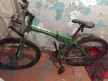 İdman velosipedləri: Dağ velosipedi – qatlanan gövdəli model Xüsusiyyətlər: - Rəng: yaşıl