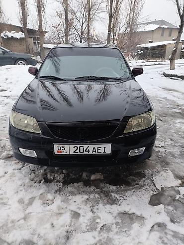 Mazda: Mazda Protege: 2001 г., 2 л, Автомат — 13