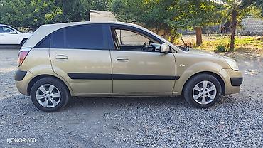 фольксваген тигуан л с: Kia Rio: 1.6 л | 2006 г. Седан — 5