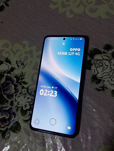 interlok tikis masini: Oppo Reno 12 F, 256 GB, rəng - Qara, Barmaq izi — 2