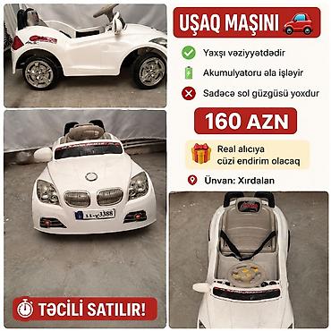 elektrikli maşınlar: Ağ rəngli uşaq maşını. Akkumulyatorla işləyən modeldir və — 1