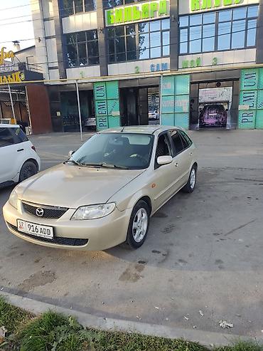 Mazda: Mazda 323: 2002 г., 1.6 л, Механика, Бензин, Универсал — 5
