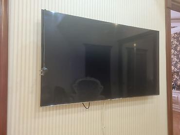 Divar asqısı ilə quraşdırılmış böyük ekranlı LED televizor lalafo.az -da Divar asqısı ilə quraşdırılmış böyük ekranlı LED televizor
