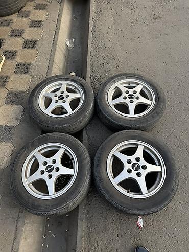 Комплект из 4 автомобильных колес в сборе: литые диски + шины. -