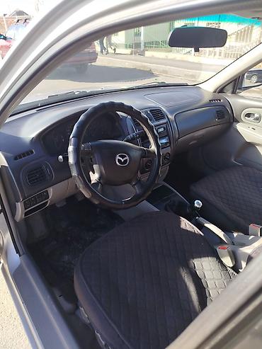 слиндир: Mazda Familia: 2002 г., Механика, Бензин, Хэтчбэк — 4