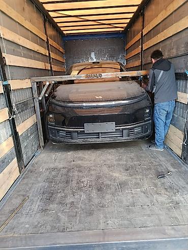 авто чихол: Закрытый автоперевоз автотранспортом (тентованный полуприцеп-автовоз) — 4
