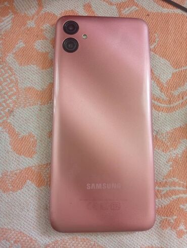 стиральная машина б: Samsung Galaxy A04, Б/у, 64 ГБ, цвет - Розовый, 2 SIM