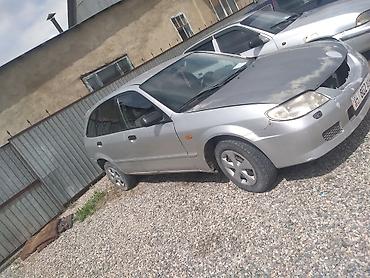 капот на нексия 2: Mazda Familia: 2001 г., Механика, Бензин, Хэтчбэк — 2