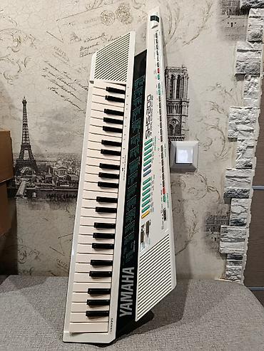 Синтезаторы: Легендарная клавитара "Yamaha SHS-200" в отличном состоянии с родным — 1