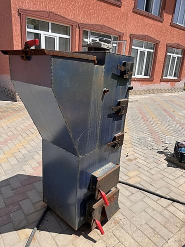 котёл уют: Твердотопливный котел/печь длительного горения из толстостенной стали — 1