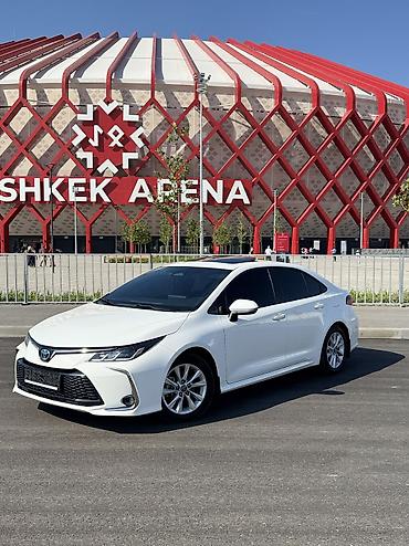 byd e1: Toyota Corolla: 2023 г., 1.8 л, Автомат, Гибрид, Седан — 1