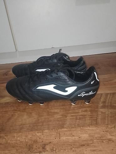 Kopačke: Kopačke Joma Aguila – crno‑bele - Model: Joma Aguila (logo i natpis — 13