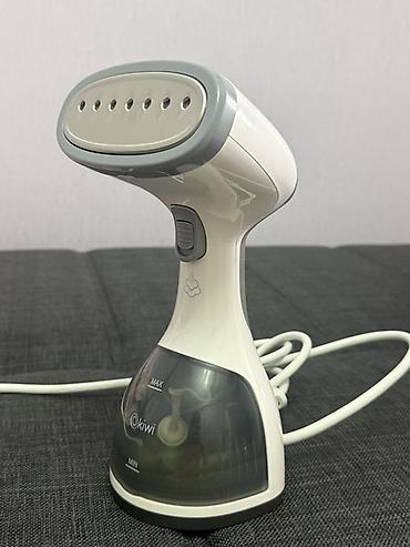 buxarli utu philips: Kiwi əl tipli geyim buxarlandırıcısı - Şaquli buxarlama üçün yüngül — 1