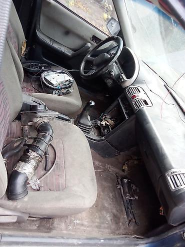 Mazda 323F, хэтчбек 5 дв., темно‑синий цвет, на разбор. - Кузов: 323F