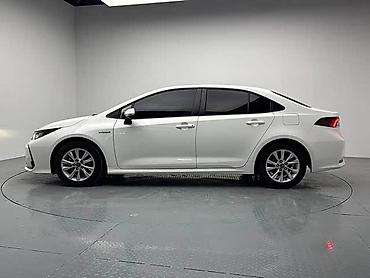 coroll: Toyota Corolla: 2023 г., 1.8 л, Гибрид — 6
