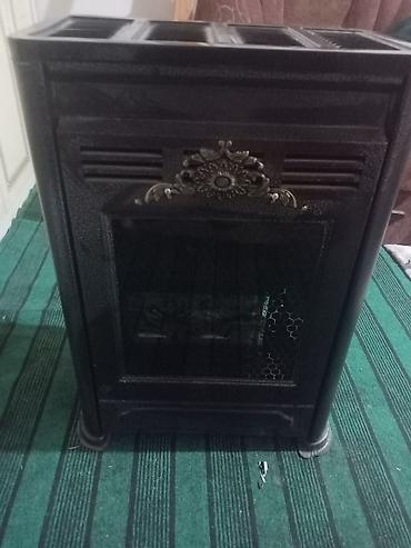 soba odun: Döşəməüstü soba/peç – dekorativ ön panel və şüşə qapılı model — 1