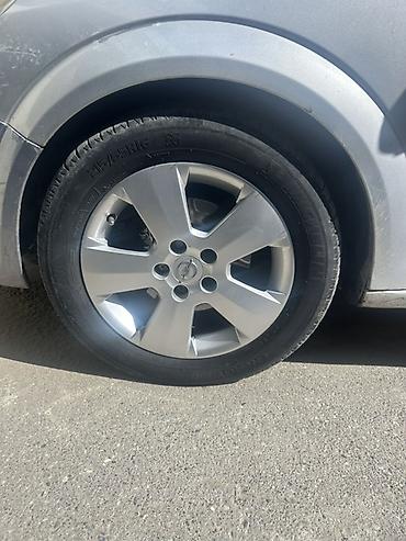 r16 michelin: Opel astra üçün orijinal 16 düymlük yüngül lehimli disk və şin — 2
