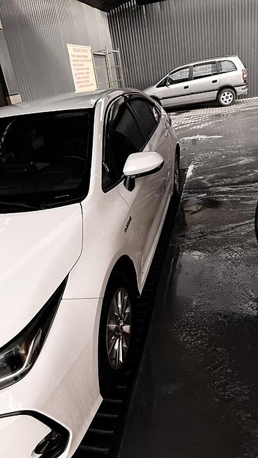 voxy noah: Toyota Corolla: 2019 г., 1.8 л, Вариатор, Гибрид, Седан — 6