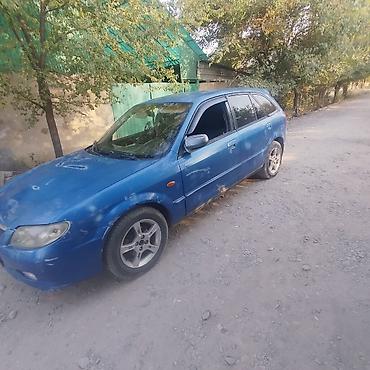 срв варкоп: Mazda Familia: 2003 г., Механика, Универсал — 4