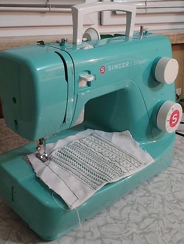 Tikiş maşınları: SINGER Simple tikiş maşını Əsas xüsusiyyətlər: - Çoxsaylı tikiş — 3