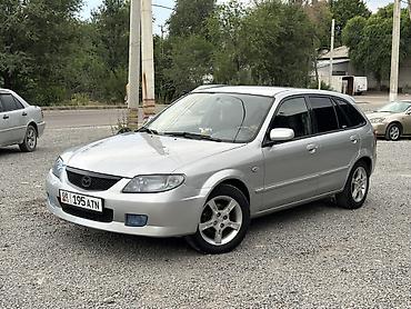 пороги демио: Mazda 323: 2001 г., 1.6 л, Механика, Бензин, Хэтчбэк — 1