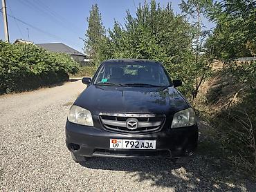 запчасти на мазда 6: Mazda Tribute: 2001 г., 2 л, Механика, Газ — 4