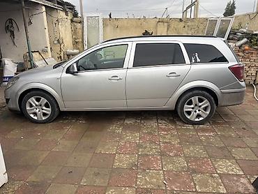 lada kalina 2008: Opel Astra Caravan (universall) – gümüşü rəng Xüsusiyyətlər: - Kuzov — 7