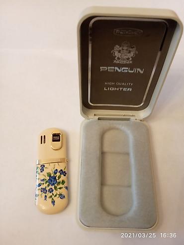 Penguin “High Quality Lighter” – qazla işləyən klassik alovlu zibtu