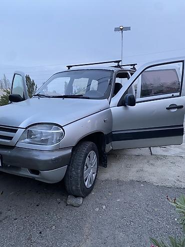 запаска шин: Chevrolet Niva: 2004 г., 1.7 л, Кол менен иштөөчү, Бензин, Кроссовер — 9