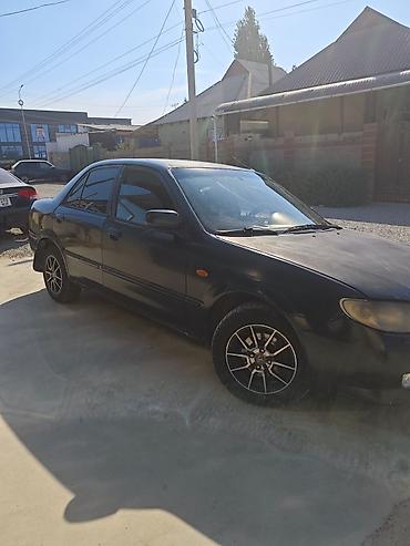 чип панели: Mazda 323: 2002 г., 1.6 л, Автомат, Бензин, Седан — 1