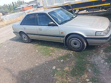 боковая: Mazda 626: 1991 г., 2 л, Автомат, Бензин, Седан — 1