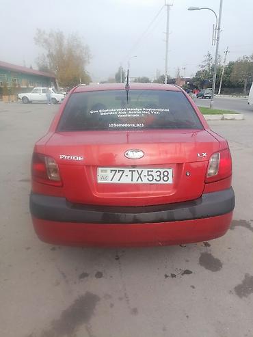 saipa saina lizing: Kia Pride LX sedan – qırmızı rəngdə, avtomatik sürətlər qutusu maşinin — 2