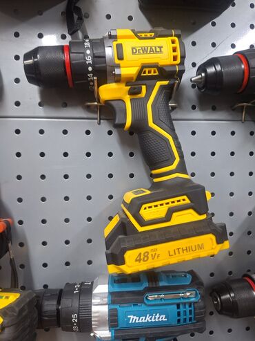 шуруповерт деволт: Аккумуляторная дрель-шуруповерт DeWalt в черно-желтом корпусе