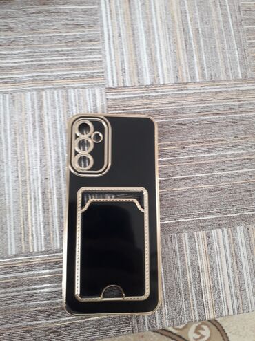 notebook qiymeti: Zərif dizaynlı smartfon üzlüyü - Rəng: Qara, qızılı haşiyələrlə -