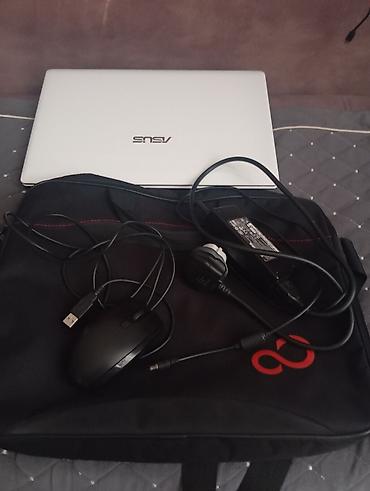 asus x509jb ej010: ASUS noutbuk – 15.6" ekranlı, ağ korpuslu model. Klaviaturası tam — 2