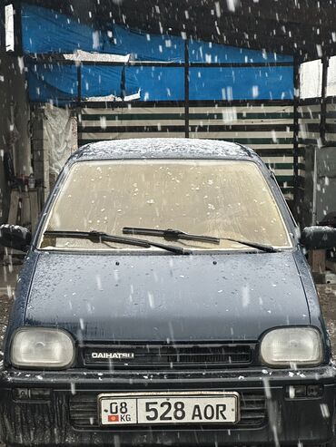 рассрочка авто: Daihatsu Cuore: 1992 г., 0.9 л, Механика, Бензин