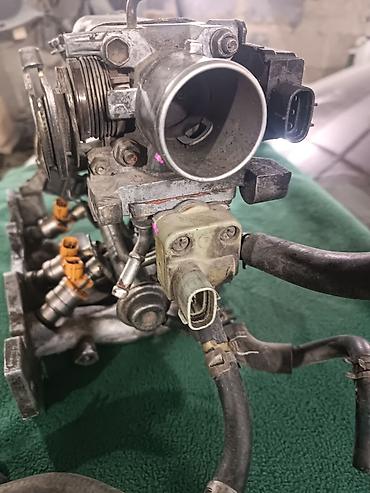 Коллекторы: Коллектор Daihatsu 1997 г., Б/у, Оригинал — 1