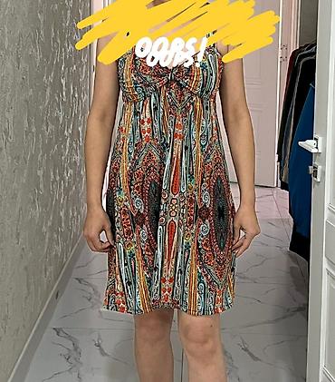 Другая женская одежда: Джинсовый комбинезон синего цвета с классическим дизайном. Модель — 31