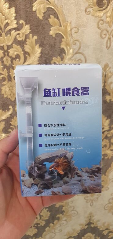 Akvarium aksessuar və ləvazimatları: Ağ rəngli silindrik korpusa malik akvarium xarici filtri. Qablaşdırma — 12