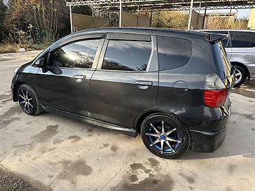 газ уста: Honda Jazz: 2005 г., 1.3 л, Автомат, Бензин, Хетчбек — 8