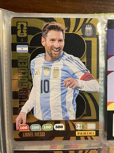 messi imzalı topu: Məhsul: Panini futbol kolleksiya kartı – “Golden Ball” seriyası — 1