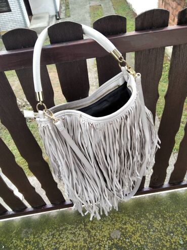 zara zenske perjane jakne: Elegant purse, Zara