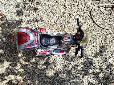 musiqili yeni il oyuncaqları: Uşaqlar üçün elektrikli motosiklet tipli minik oyuncağı. 3 təkərli — 3