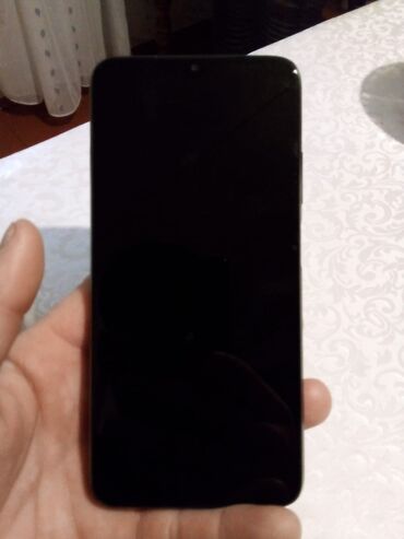 telefonlar işlenmiş: Xiaomi Redmi 9T, 64 GB, rəng - Qara, 
 Barmaq izi, İki sim kartlı, Face ID