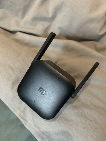 Модемы и сетевое оборудование: Усилитель Wi-Fi сигнала Xiaomi Mi Wi-Fi Range Extender Pro состояние