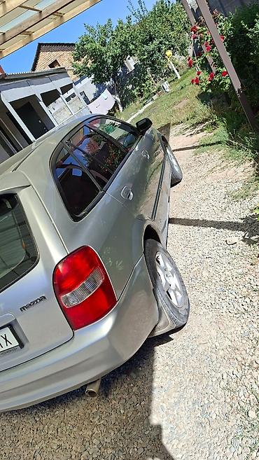 li ion: Mazda 323: 2002 г., 1.6 л, Автомат, Бензин, Седан — 4